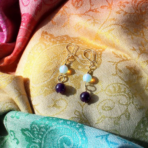 Earrings with amethyst and glass opal beads and 14k-gold trim