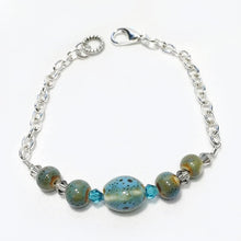 Silver chain bracelet with blue-grey ceramic beads