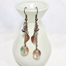 Copper and crystal earrings with leaf accents