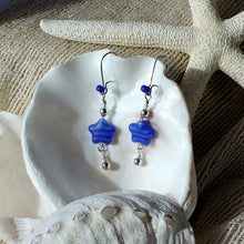 Blue star-shaped Czeck swirl beads with silver dangle bead