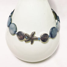 Dusky blue shell bracelet and matching earrings