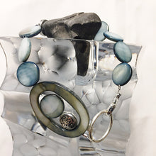 Dusky blue shell bracelet and matching earrings