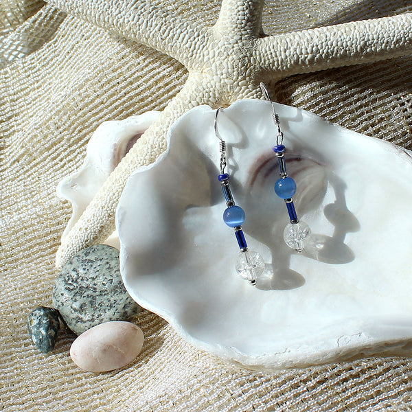 Earrings featuring blue crackle-glass beads and silver trim