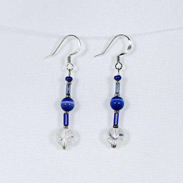 Earrings featuring blue crackle-glass beads and silver trim