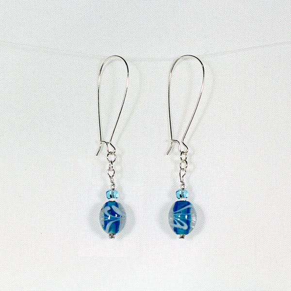 Earrings with turquoise-colored swirl glass beads