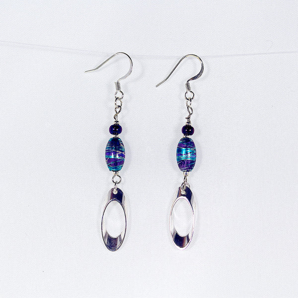 Earrrings featuring blue and purple beads with silver swirl design