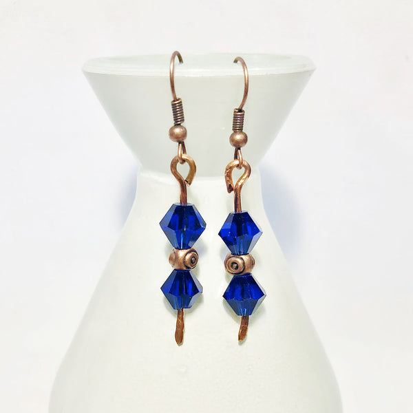 Hammered copper earrings with cobalt blue glass beads