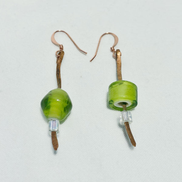 Hammered copper earrings with green glass beads