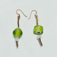 Hammered copper earrings with green glass beads