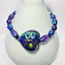 Stretch Purple Bead Bracelet with Puffy Glass Heart