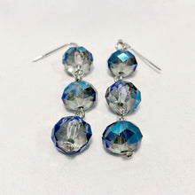 Stormy ocean-blue Swarovski crystal triple-drop earrings