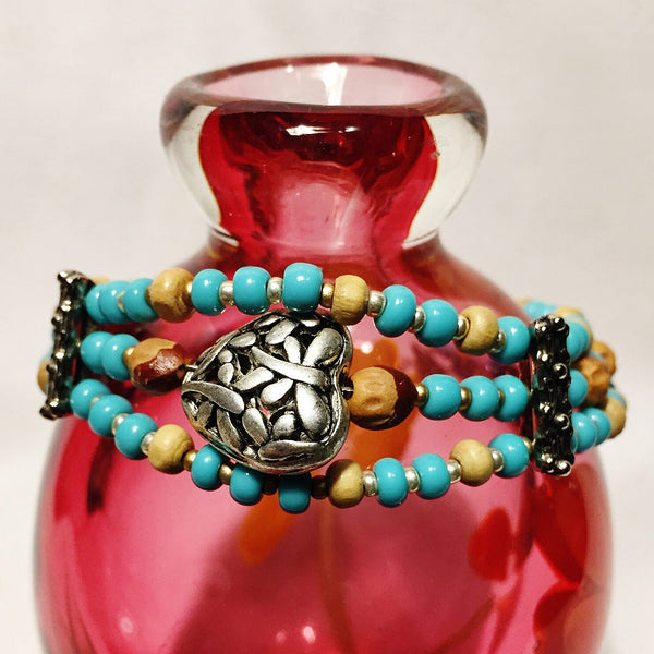 Turquoise glass wood bracelet with silver dragonfly heart bead