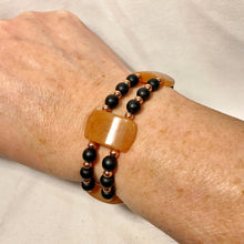 Two-Strand Bracelet with Polished Peach Agate, Copper, and Black Stone Beads